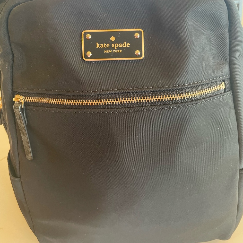 Kate Spade Black CanvasBackpack with Gold Accents. Excellent Condition.